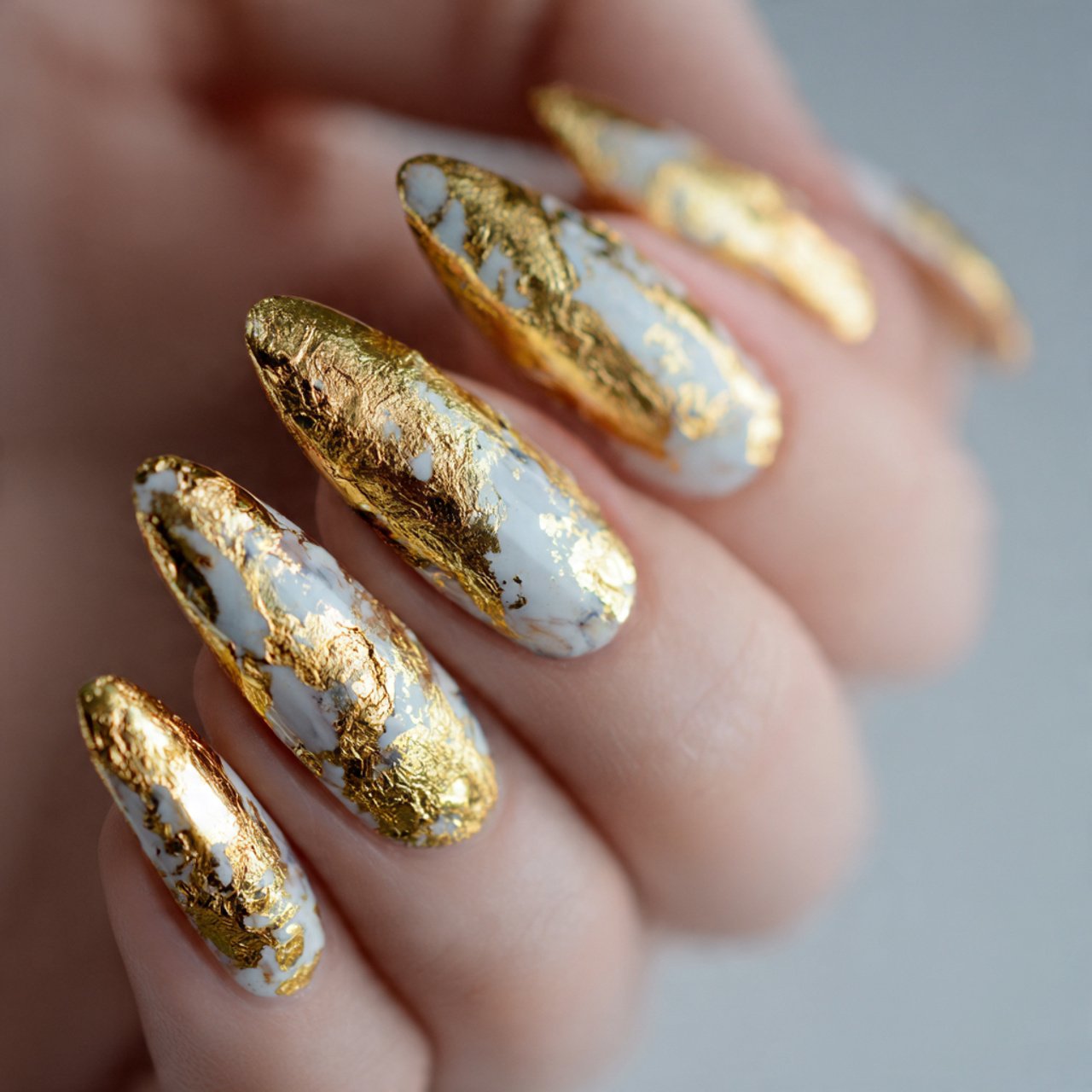 gold foil on nude nail