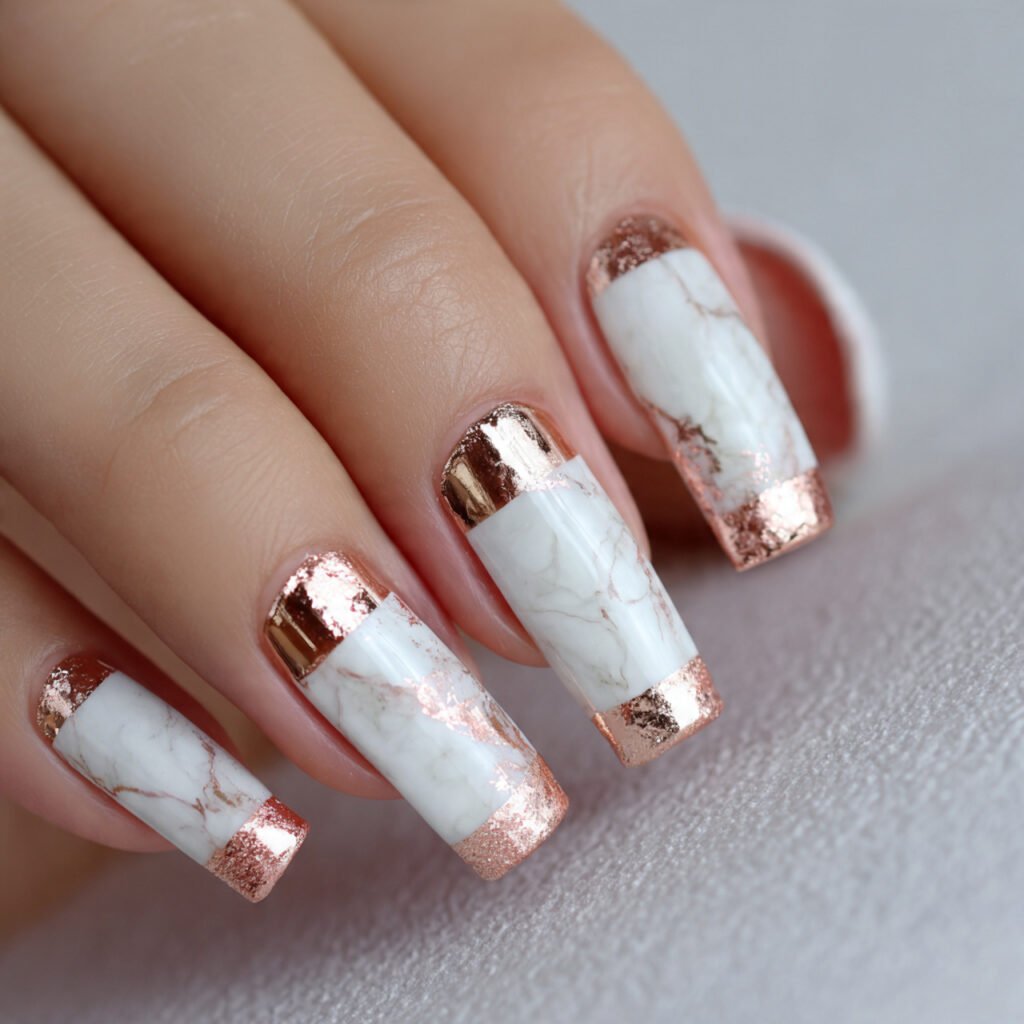 rose gold with white marble accents nails