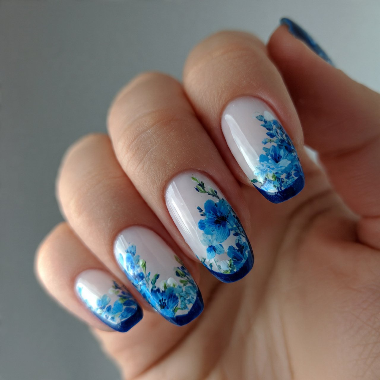blue floral accent on base attractive nails