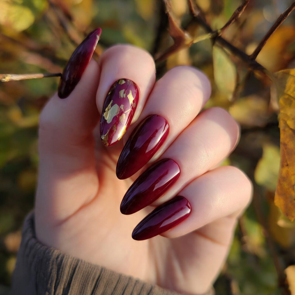 burgundy glass nails on a nature background
