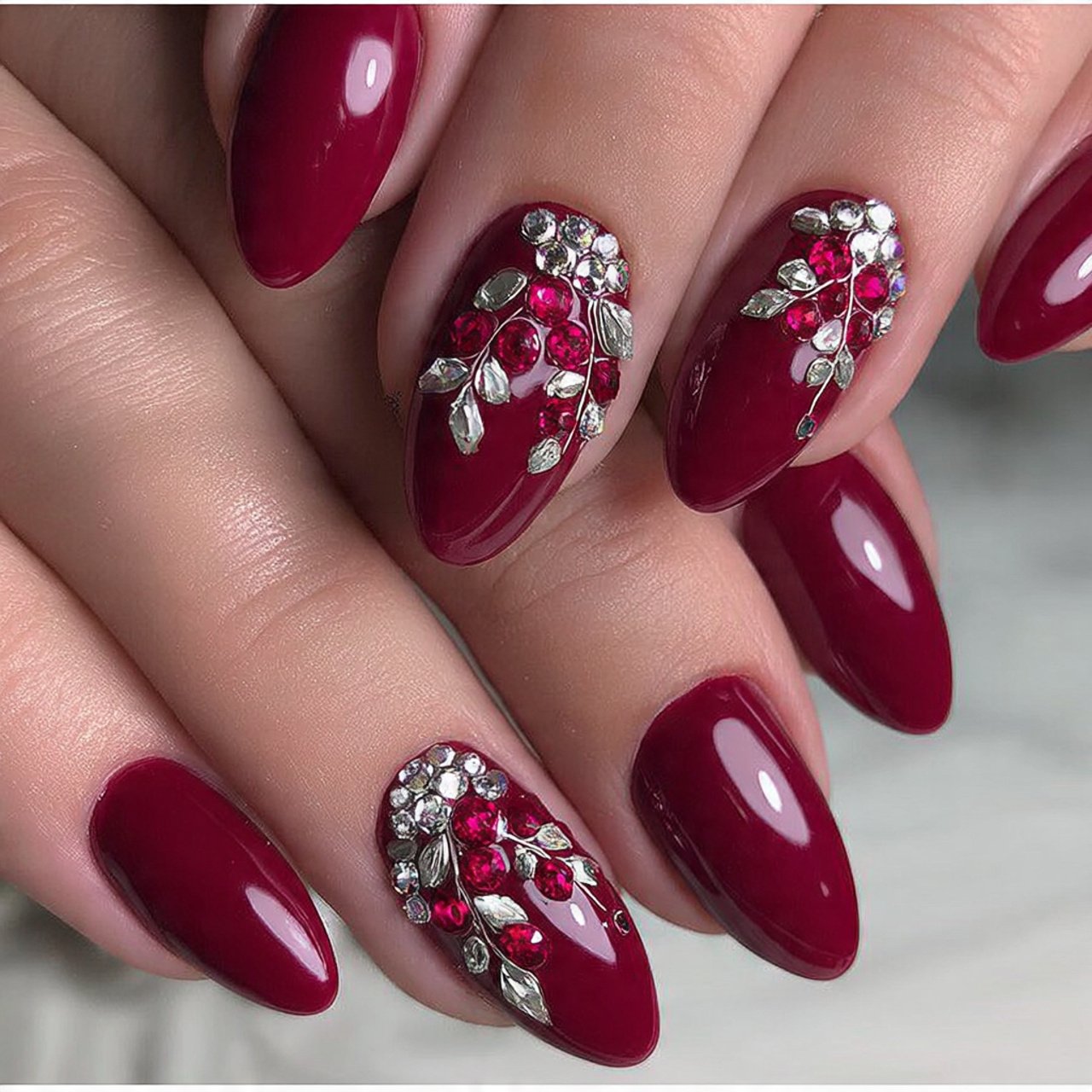 cherry red with rhinestone detail nature look nail