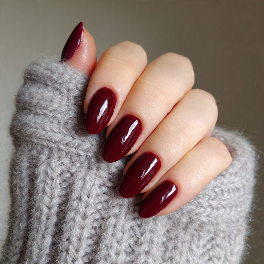deep oxblood cr me quiet luxury red nails