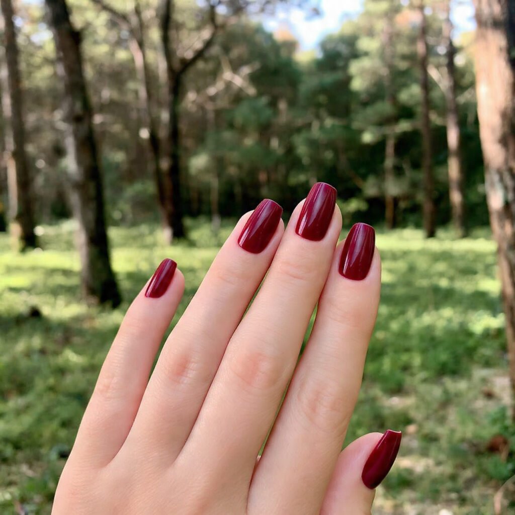 oxblood quiet luxury nails nature background nails