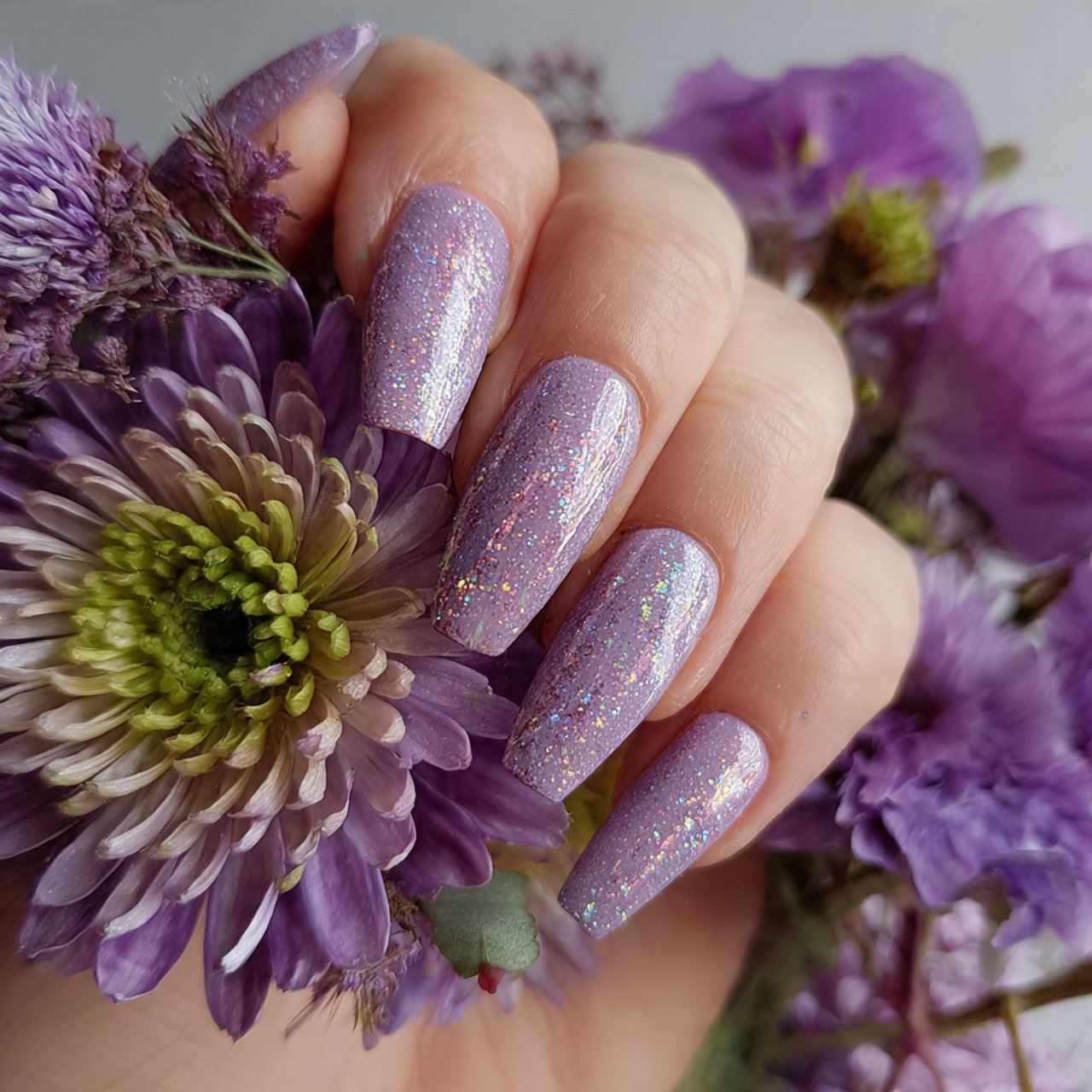 pastel purple with holographic glitter nature look
