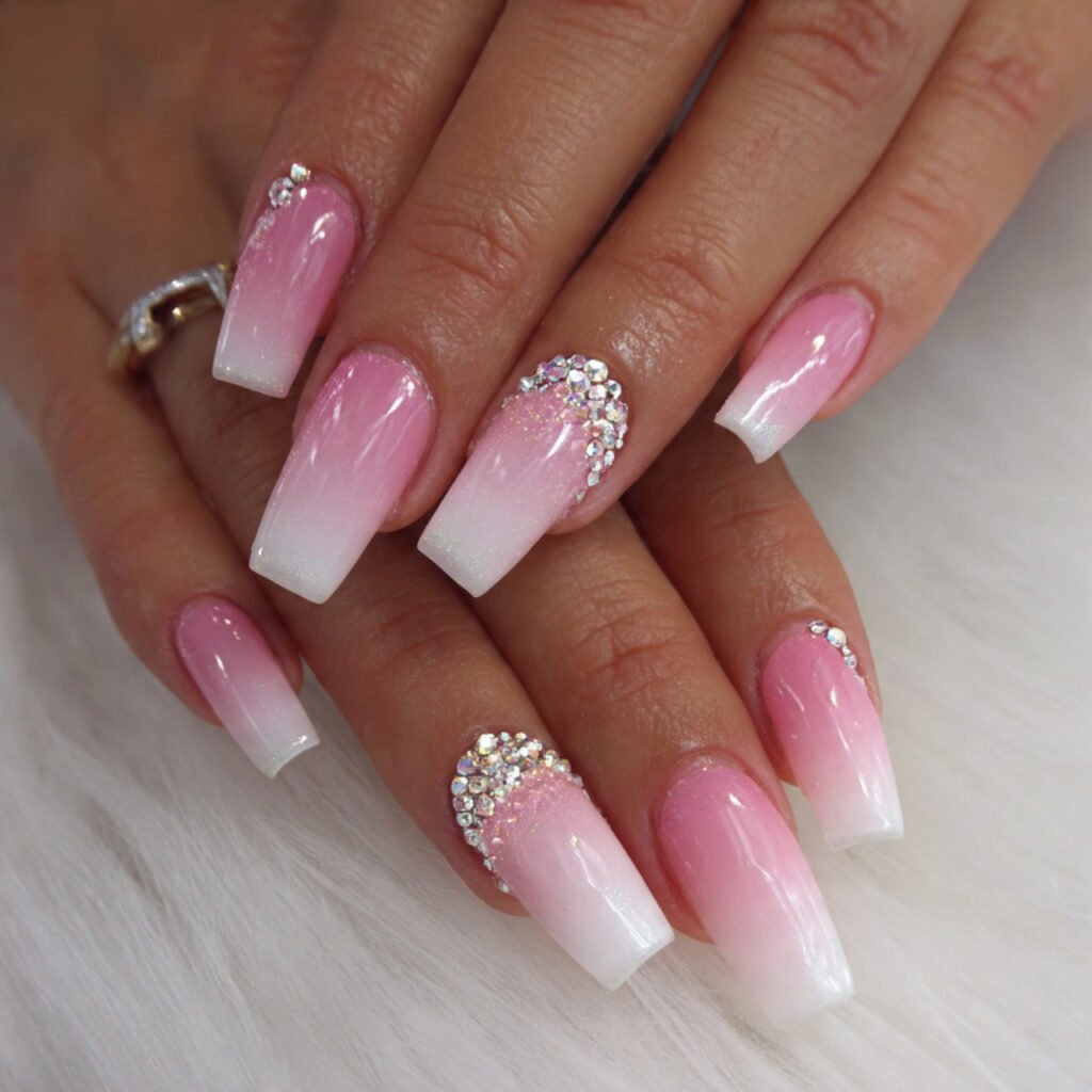 pink and white ombre with rhinestone tips attracti
