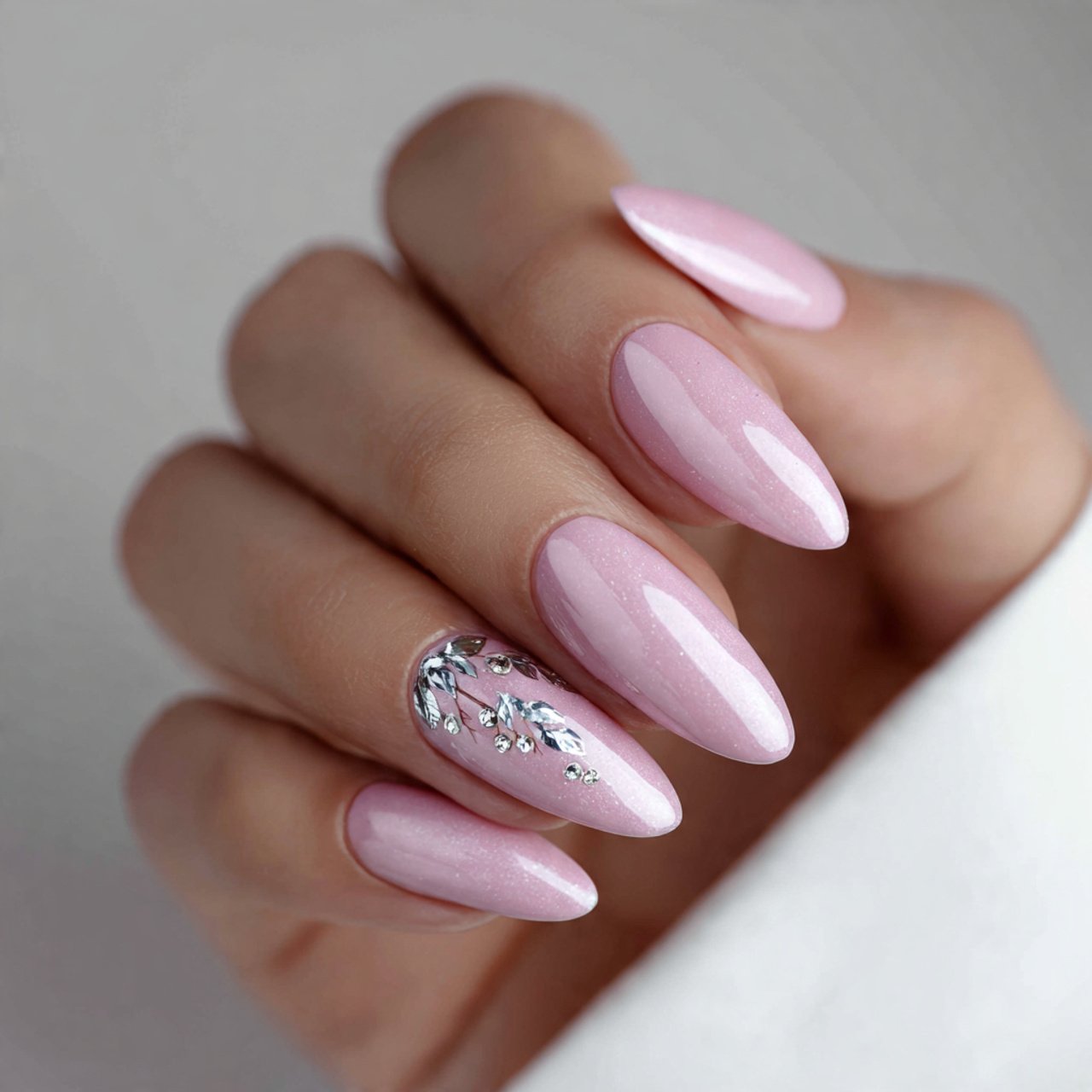 soft pink almond nails with silver accents nature
