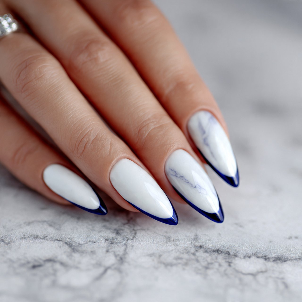 white cat eye nails with navy blue accent nature n