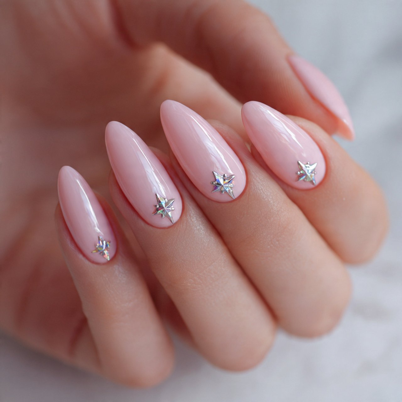 ballet pink nails with silver star accents nails