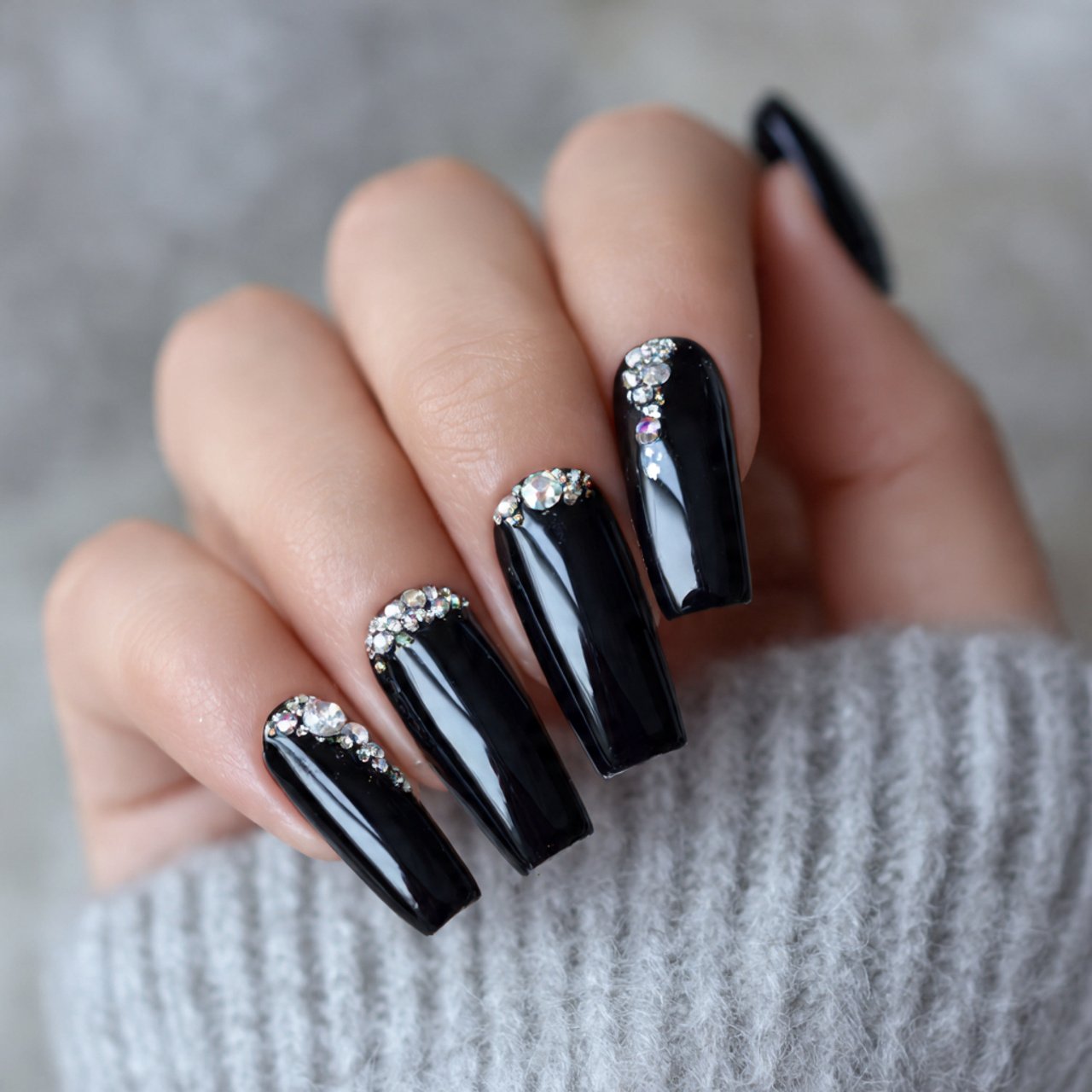 black nails with tiny crystal accents nails