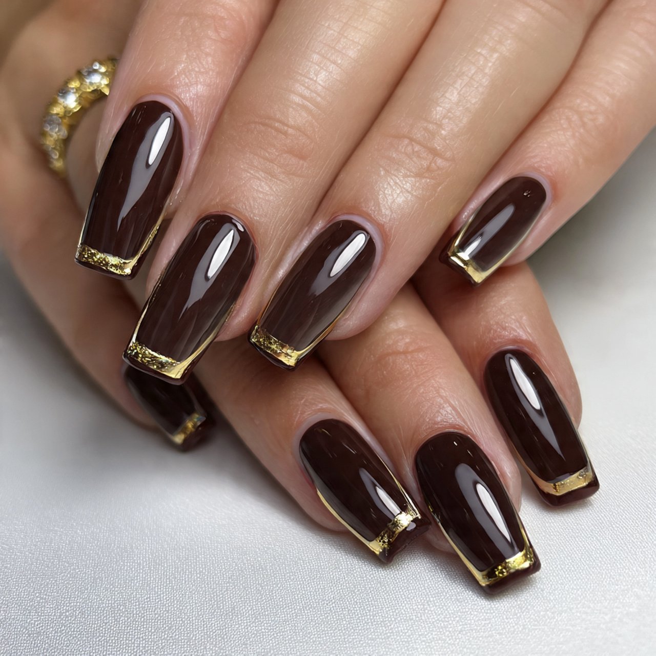 brown micro french with gold detail descent look n