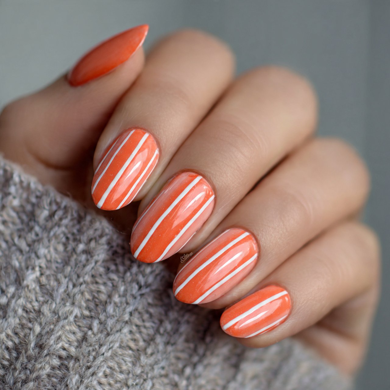 coral with white stripes gorgeous nails