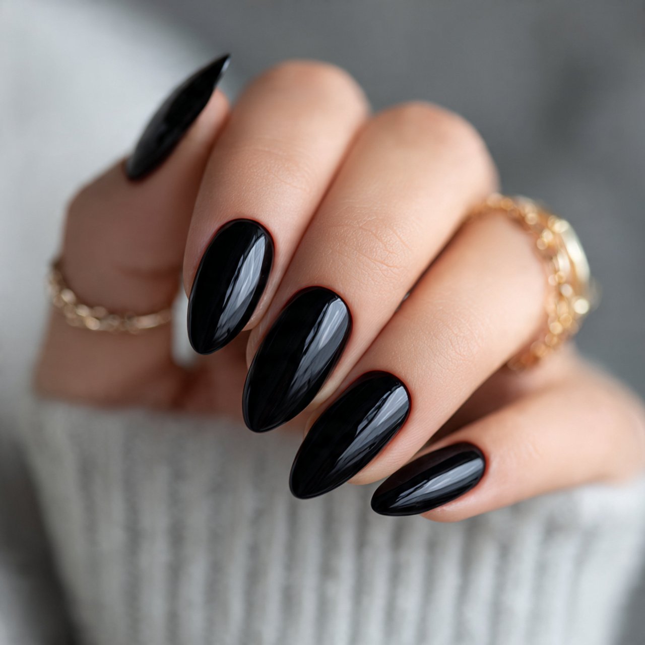 glossy black short almond nails