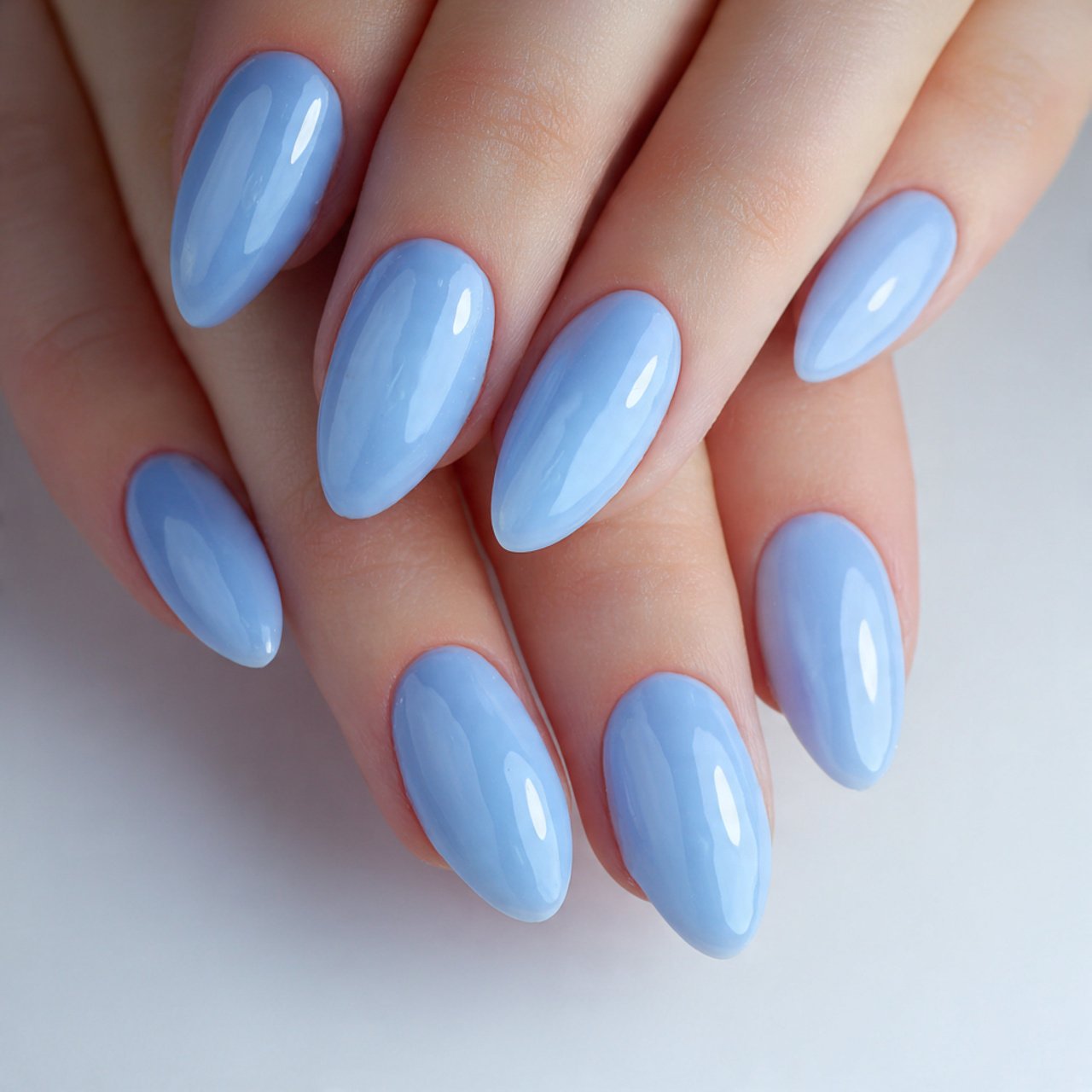 milky blue nails with a glazed finish stunning nai