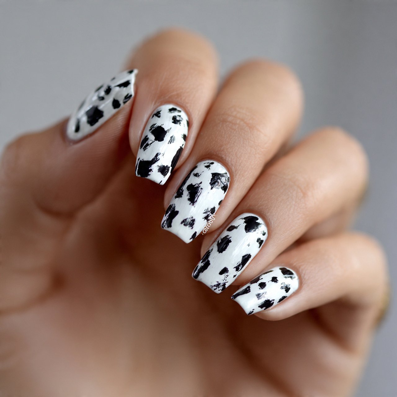 milky white cow print nails decent look nails