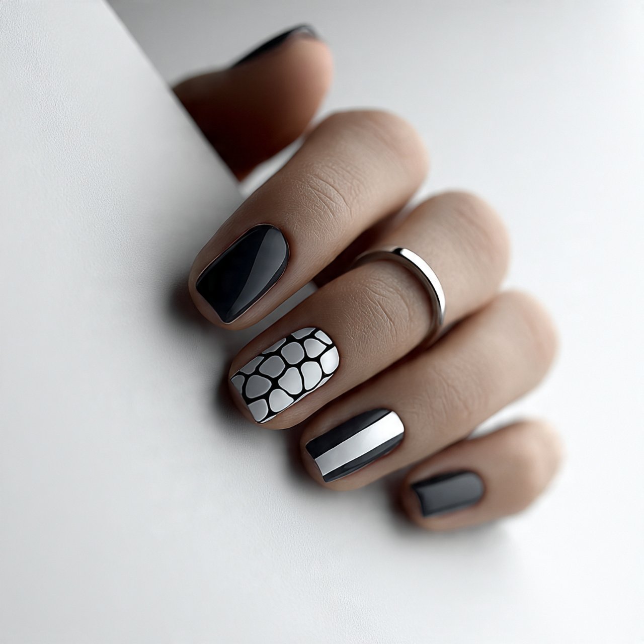 navy nails with brown animal print accents attract