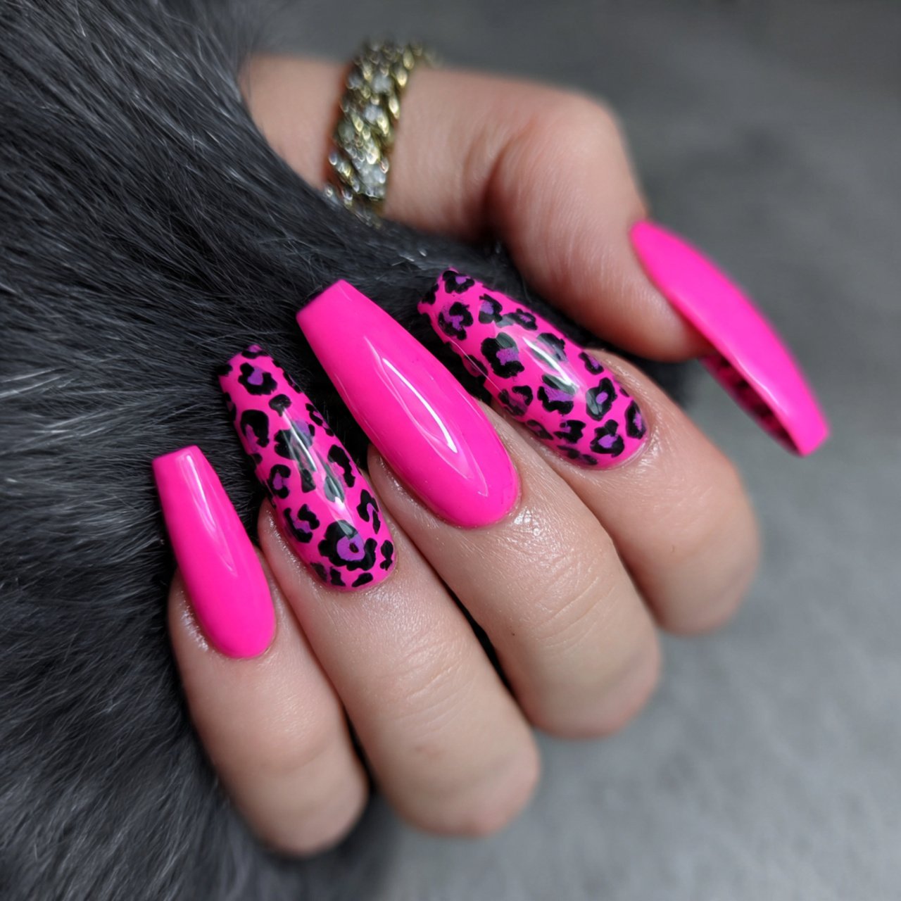 neon pink coffin nails with animal print creative