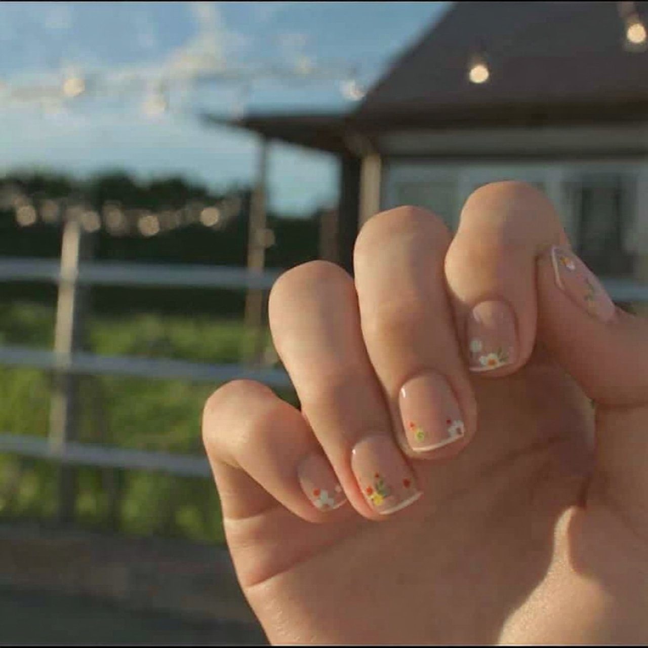 tiny polka dot party nails natural look background