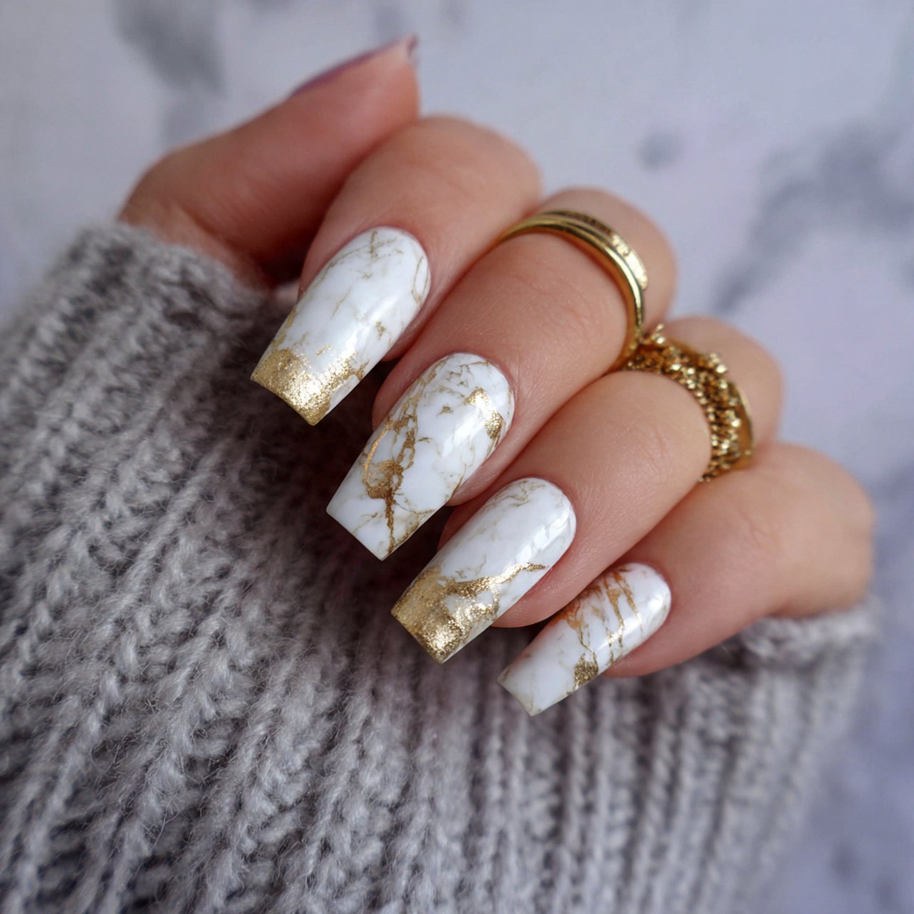 white and gold marble accents cool looking nails