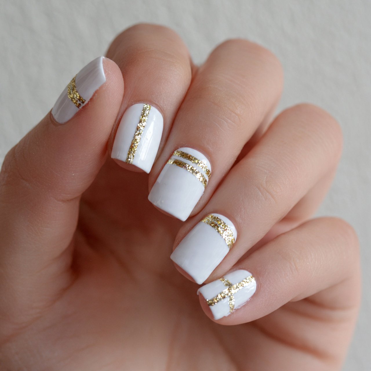 white nails with gold accents pretty nails