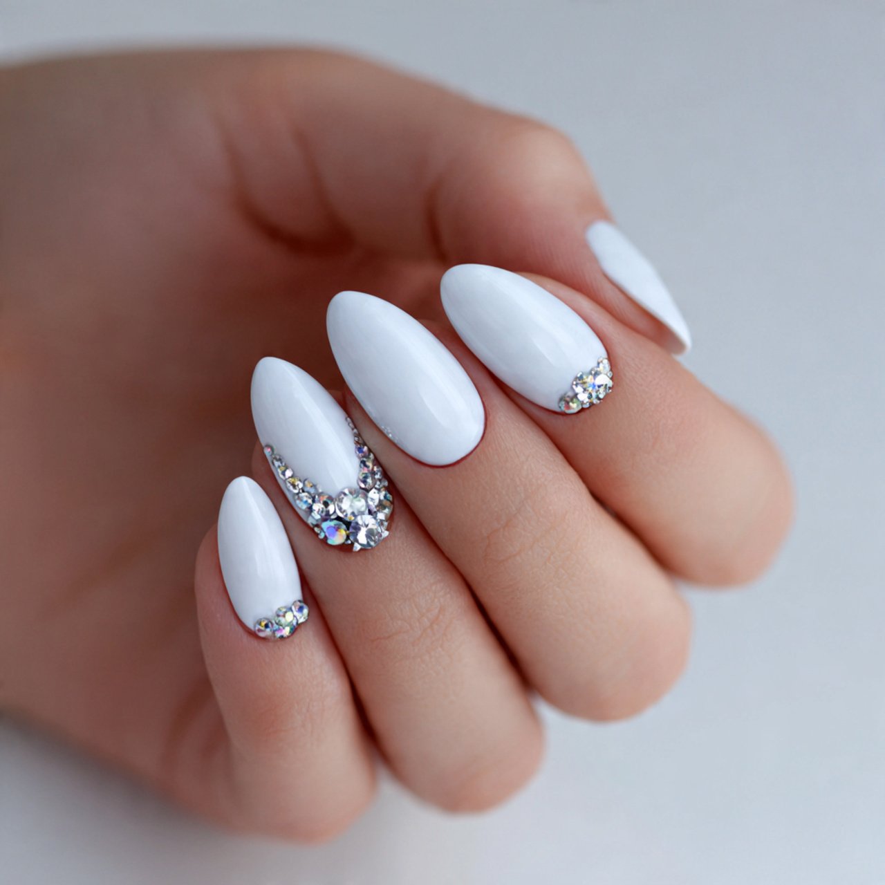 white nails with tiny rhinestone details attractiv