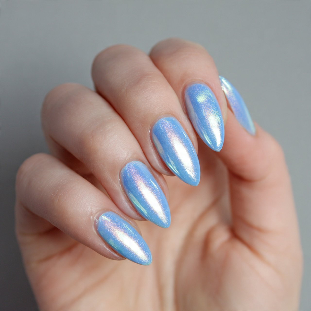Blue Cat Eye Nails: 15 Reflective, Modern Designs That Look Salon-Luxury 3 baby blue glazed cat eye nails