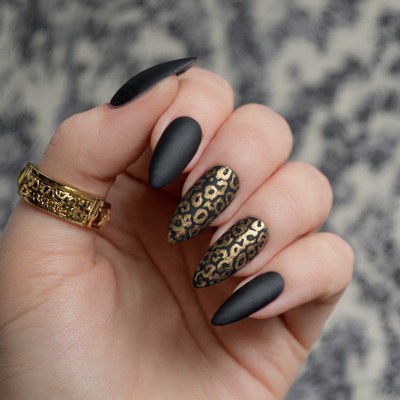 black and nude leopard nails