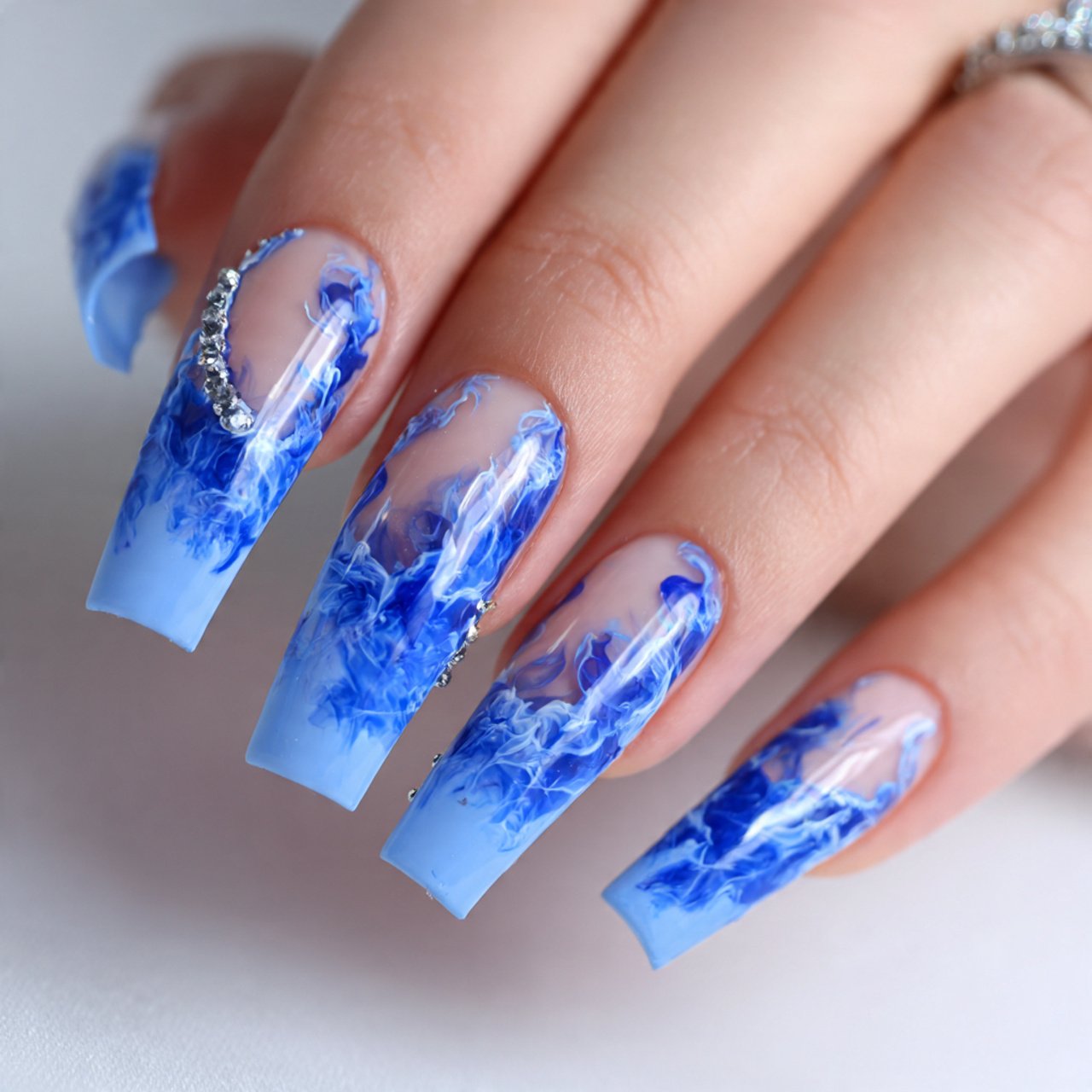 blue acrylic nails with negative space nails