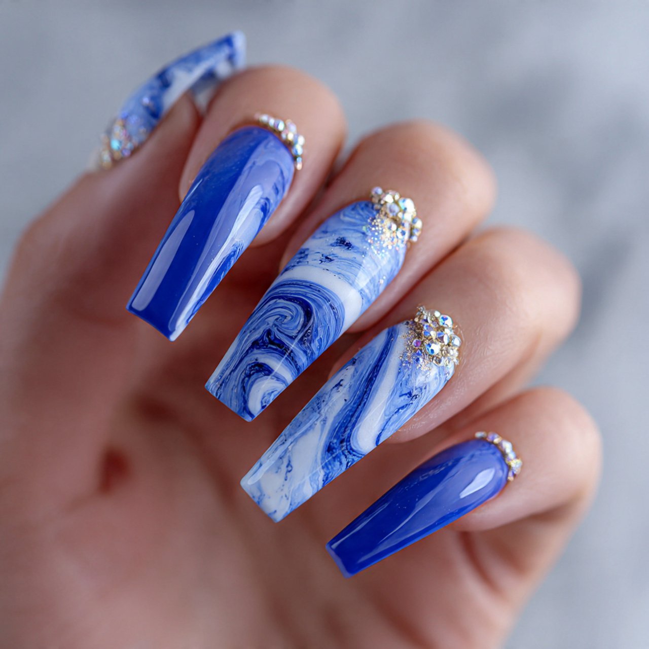 blue acrylic nails with white swirls nails
