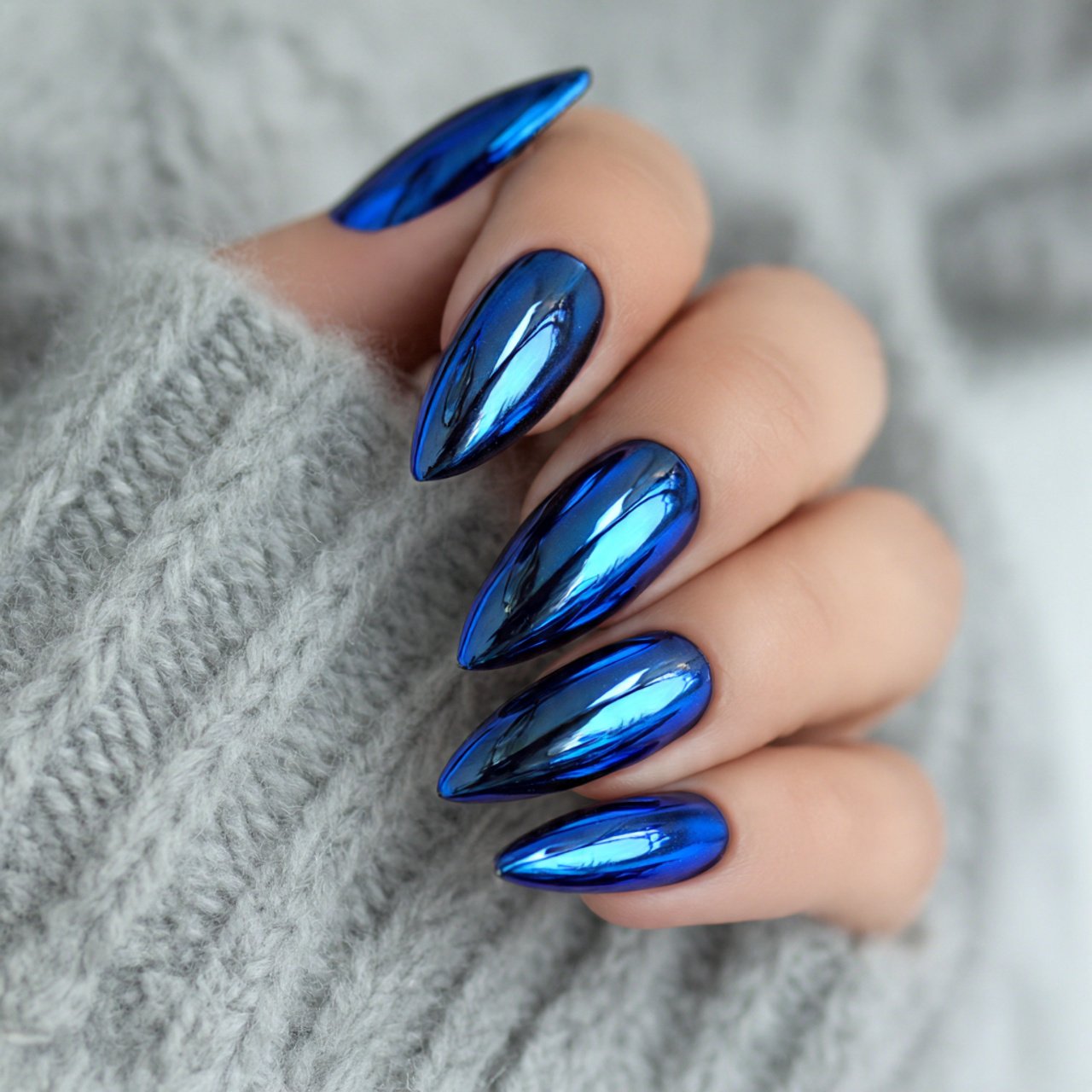 blue chrome cat eye effect nails