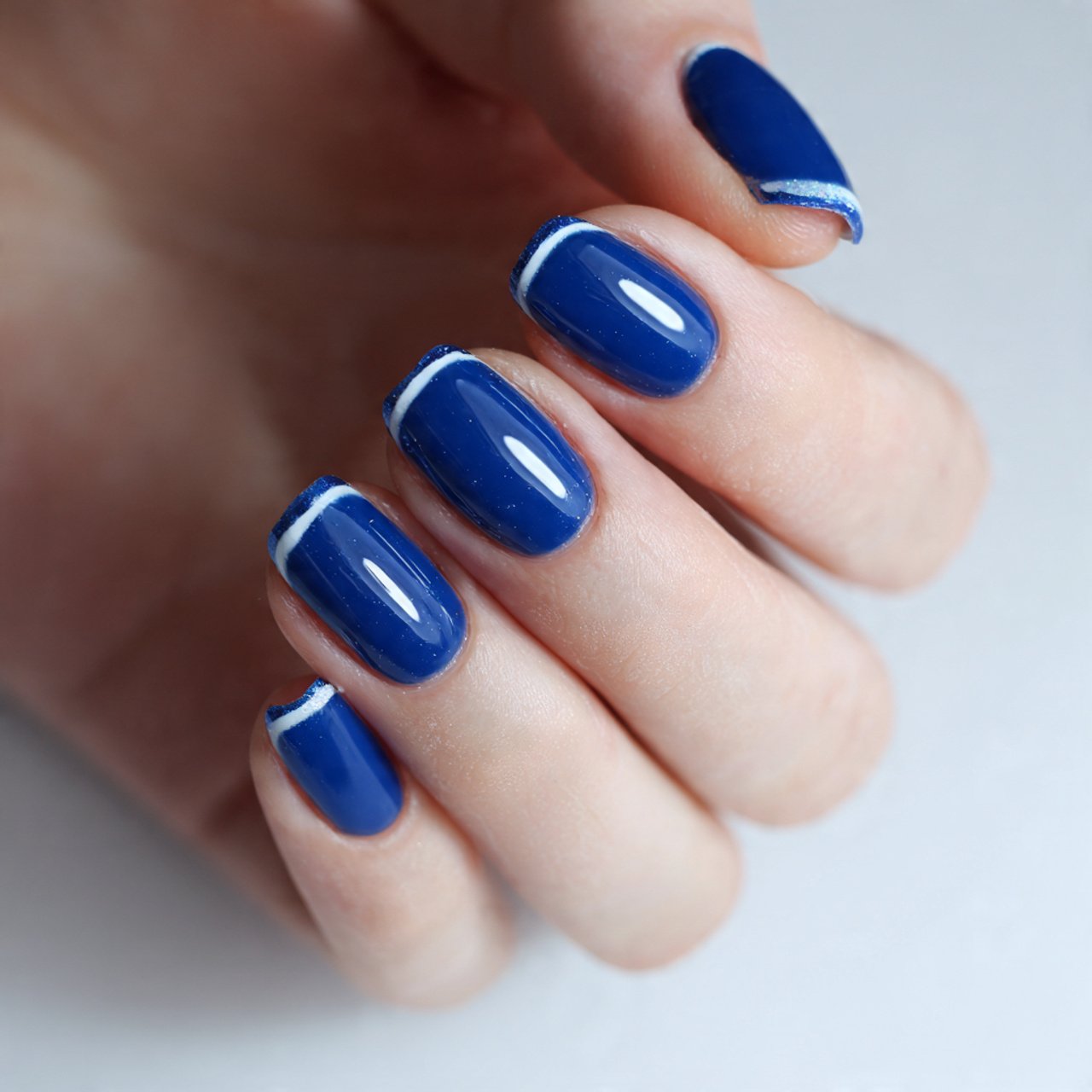 blue french nails with white outline nails