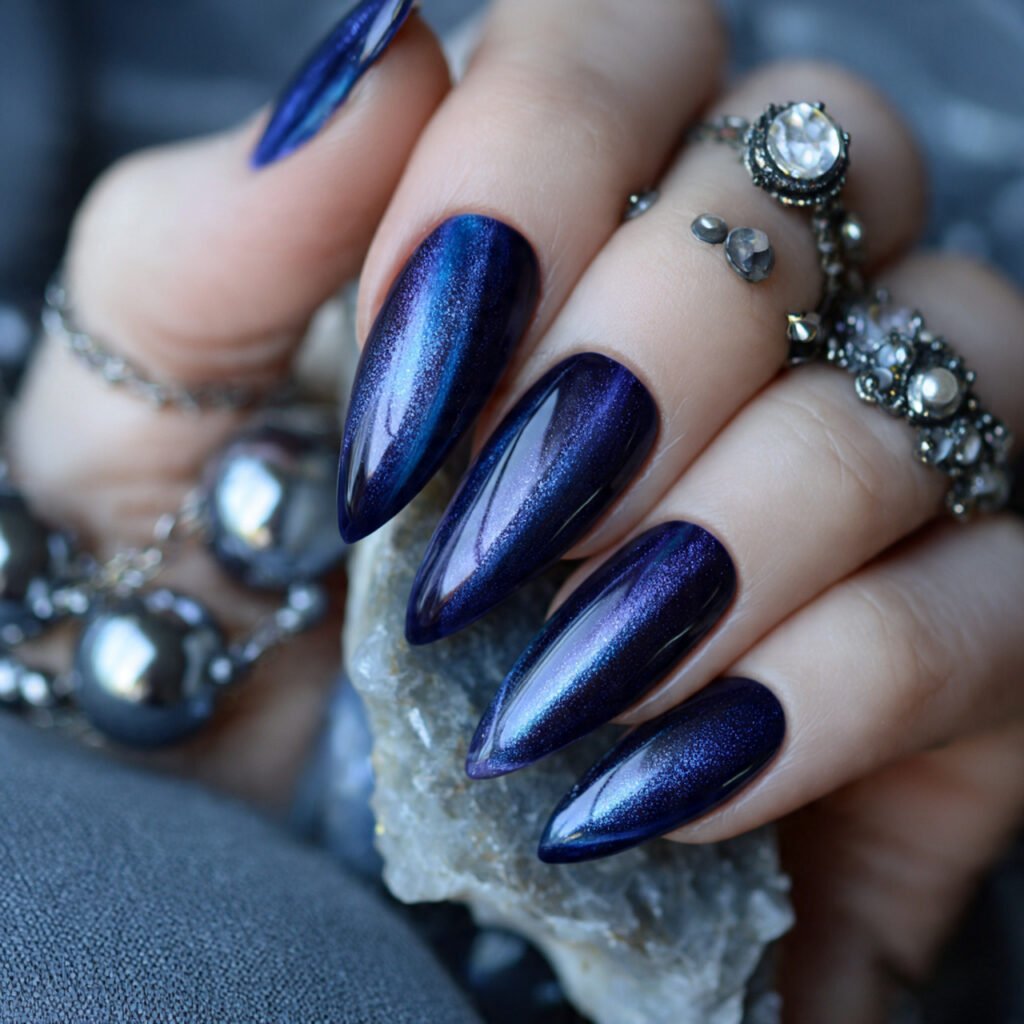Blue Cat Eye Nails: 15 Reflective, Modern Designs That Look Salon-Luxury 14 blueberry toned cat eye skittle nails 1