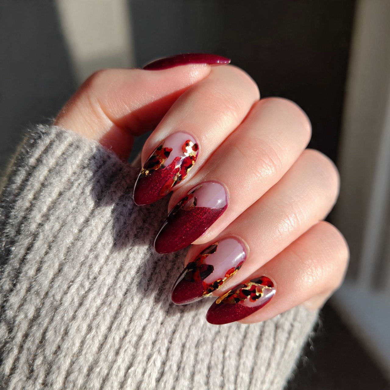 burgundy tortoiseshell accent almond nails