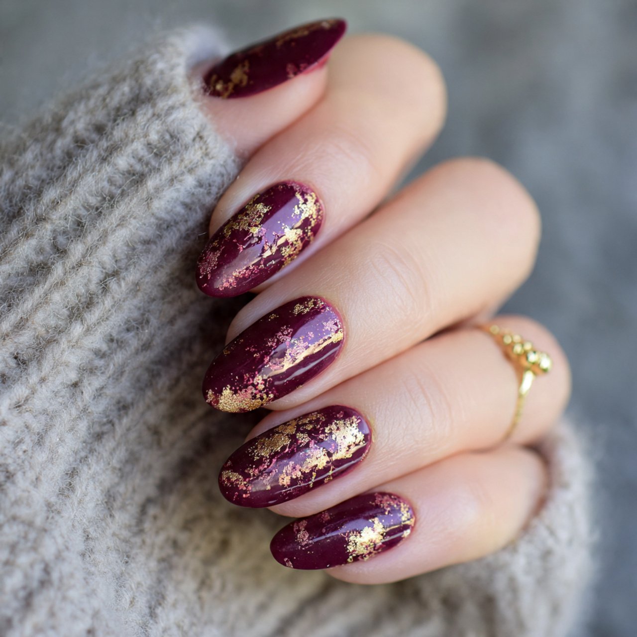 burgundy with gold foil accents nails