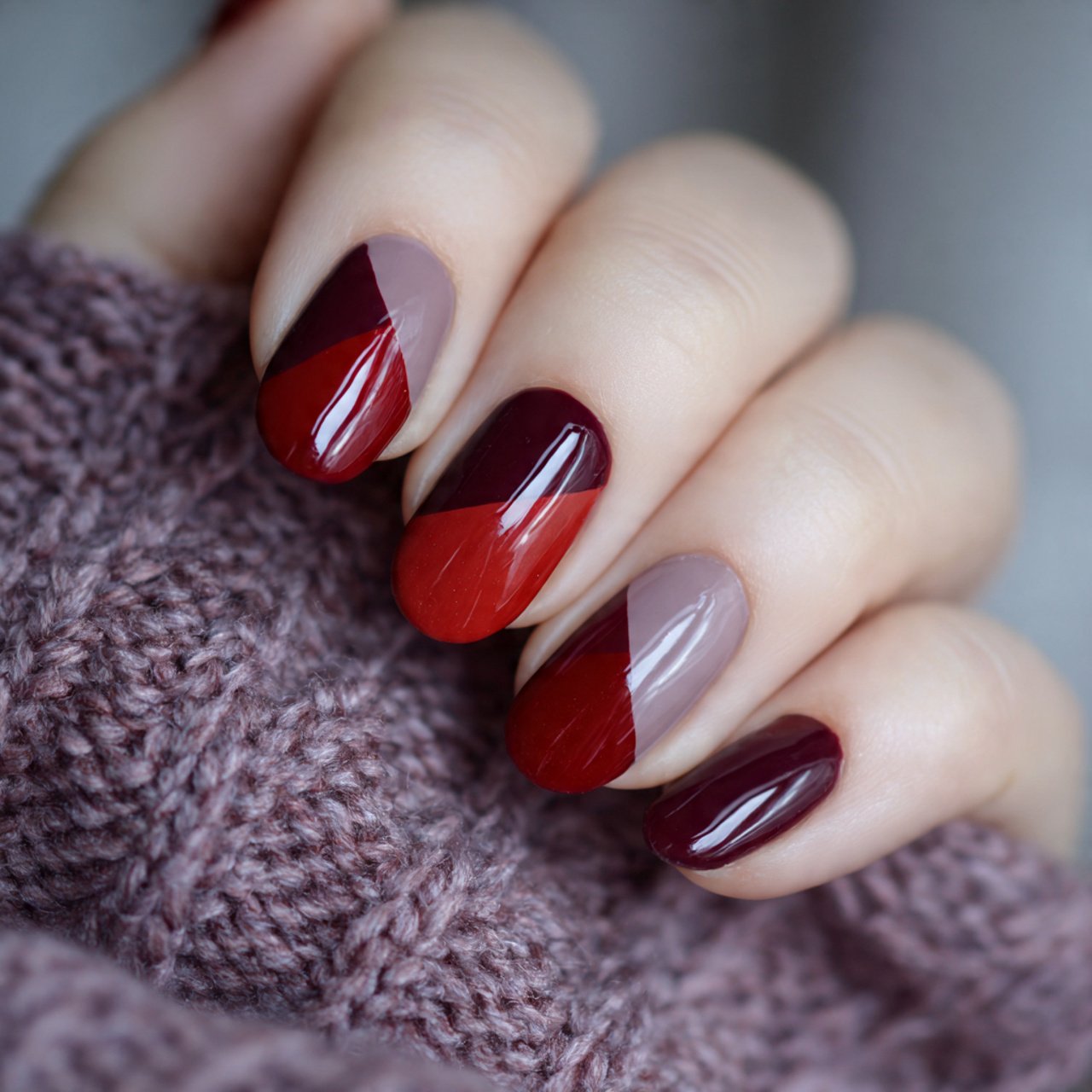 maroon and diagonal color block nails