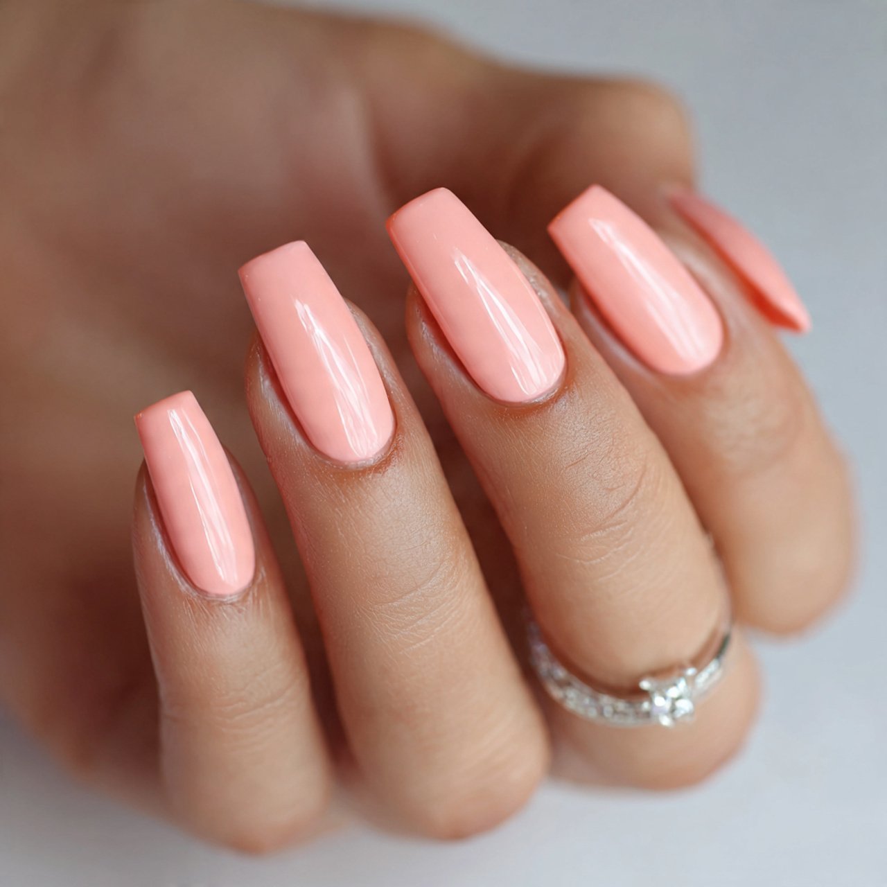 soft peachy pink acrylic nails