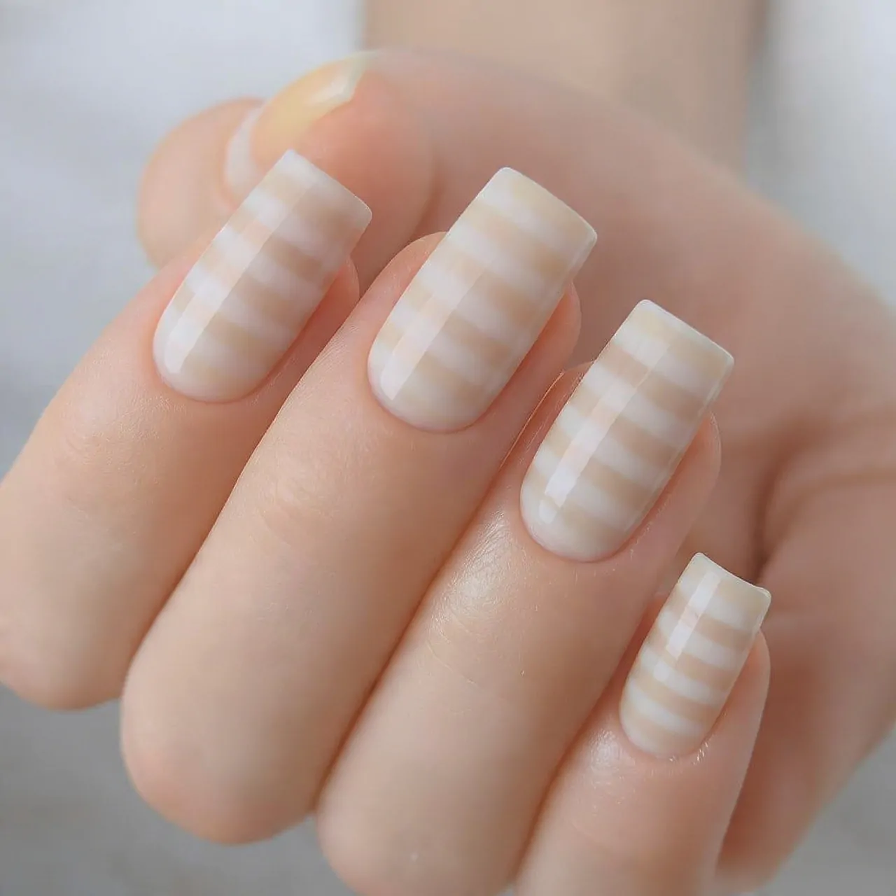 Striped Nails: 15 Chic Stripe Nail Designs That Look Clean, Modern, and Salon-Perfect 4 beige white tonal stripes soft quiet