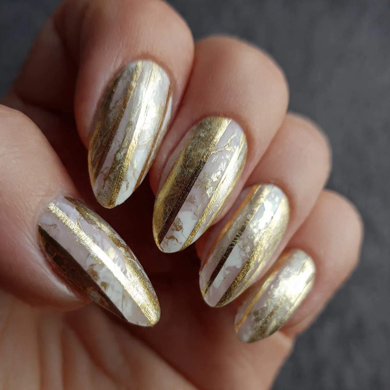 Striped Nails: 15 Chic Stripe Nail Designs That Look Clean, Modern, and Salon-Perfect 6 metallic gold stripe over a milky base