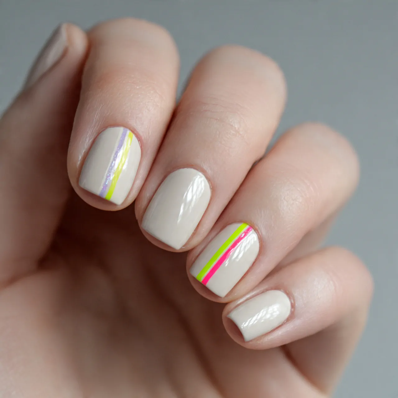 Striped Nails: 15 Chic Stripe Nail Designs That Look Clean, Modern, and Salon-Perfect 13 neon accent stripe on a neutral base