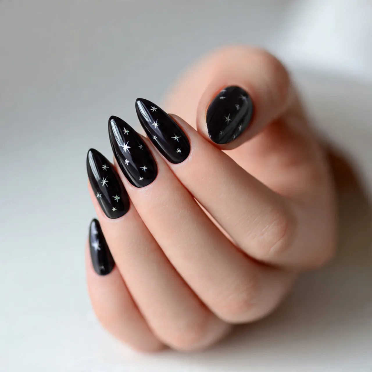 black tiny star accent nails