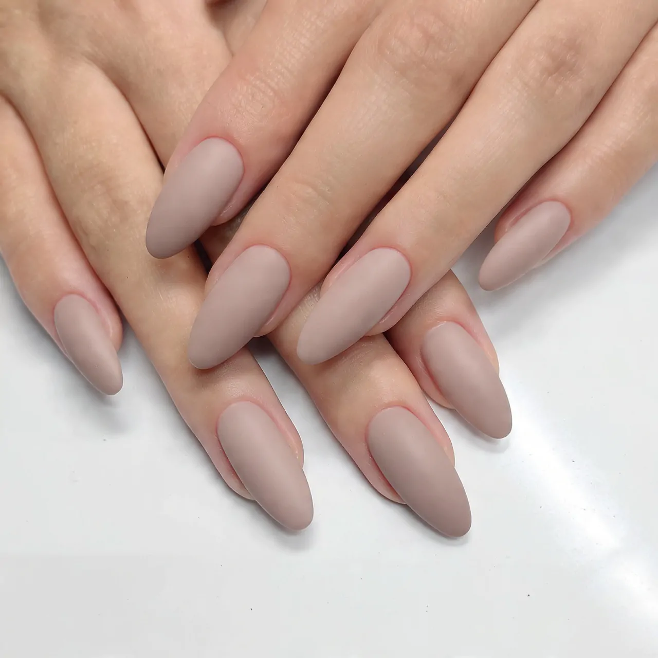 soft taupe stone almond attractive nails image