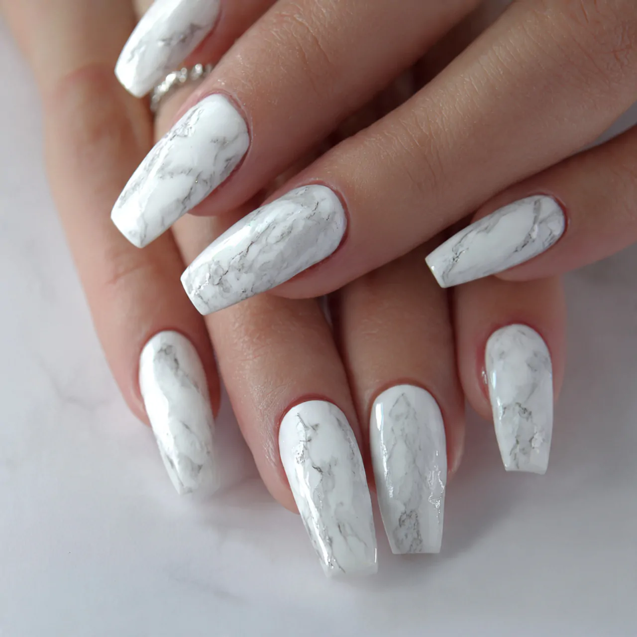 White Nails Ideas: 15 Chic Designs That Always Look Fresh 12 white marble nails gorgeous nails