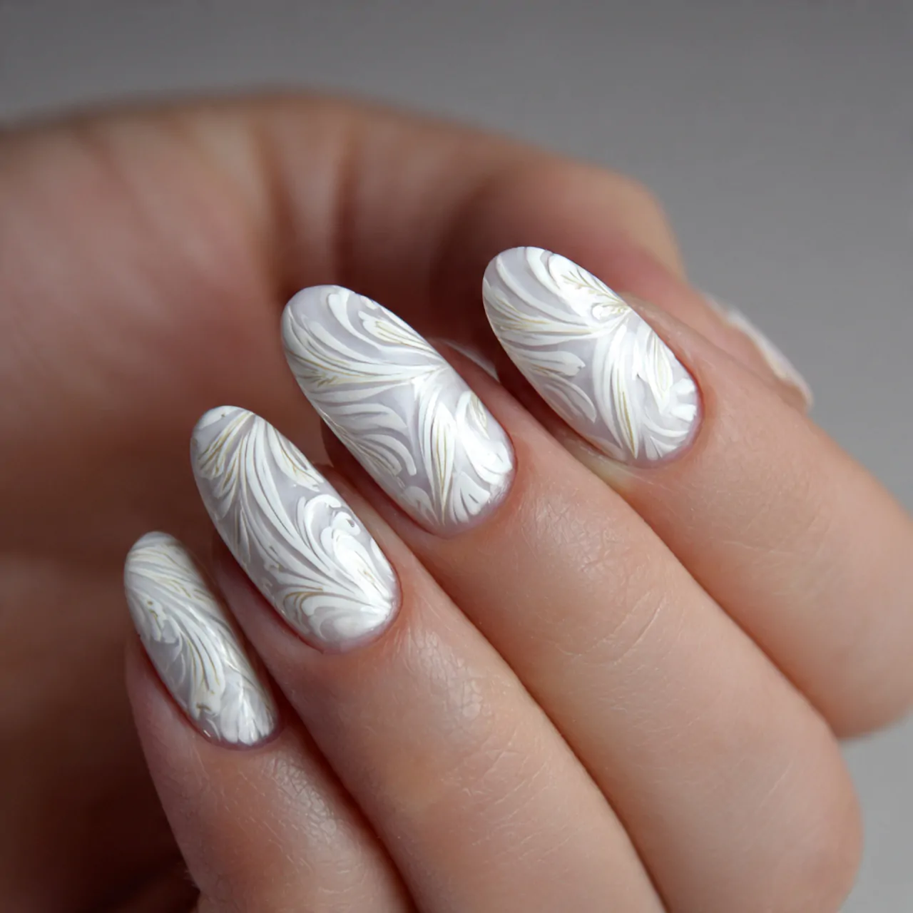 White Nails Ideas: 15 Chic Designs That Always Look Fresh 10 white swirl nails stunning nails