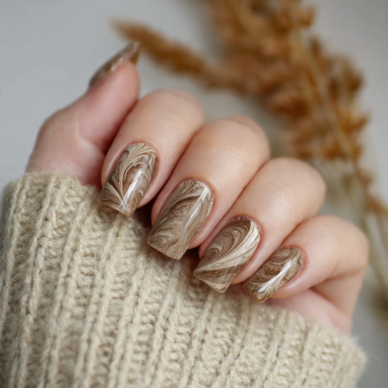 Nail Art Aesthetic: 15 Stylish Designs That Look Beautiful and Wear Well 3 taupe swirl nails on a sheer base nails